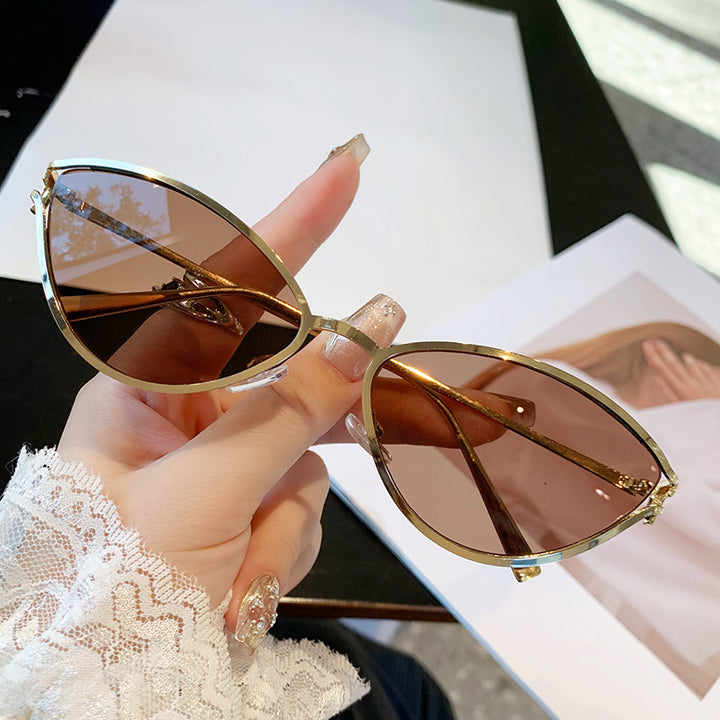 Ladies Cat-Eye Sunglasses with Elegant Metal Frame and UV Protection Stornfield