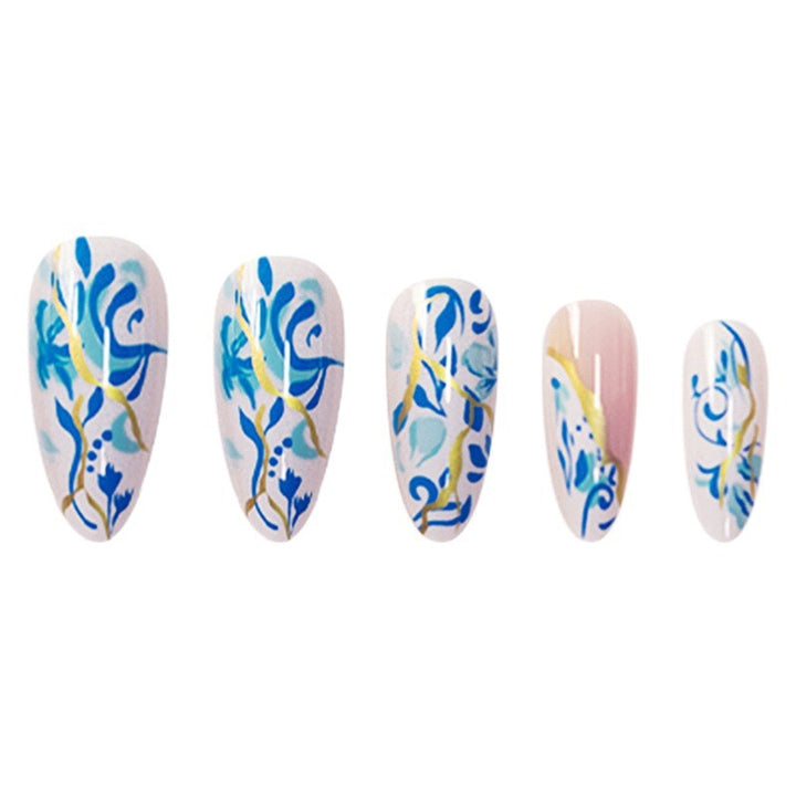 Artistic Floral Press-On Nail Design with Gold Accents Stornfield