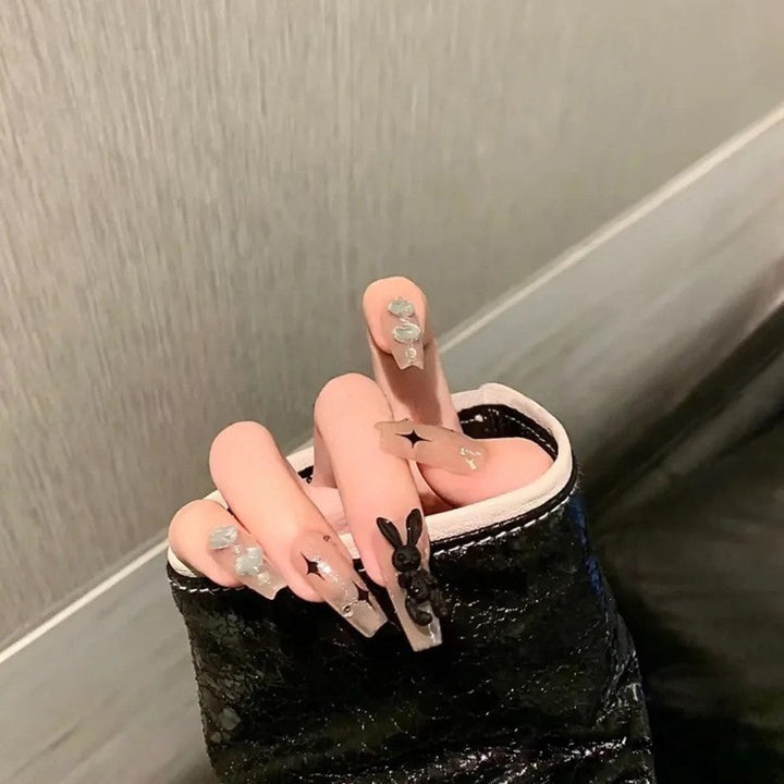 Artificial nails with decorative arches and pearls Stornfield