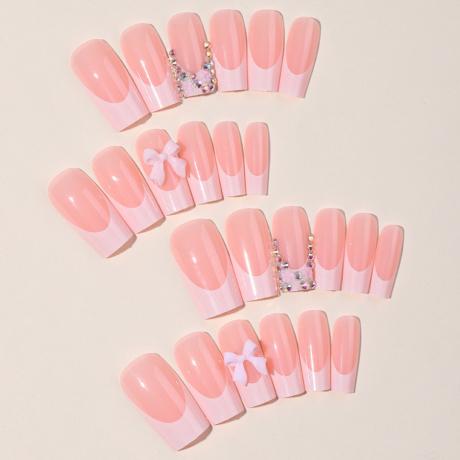 Artifical nail set with glamorous 3D bows and crystal embellishments Stornfield