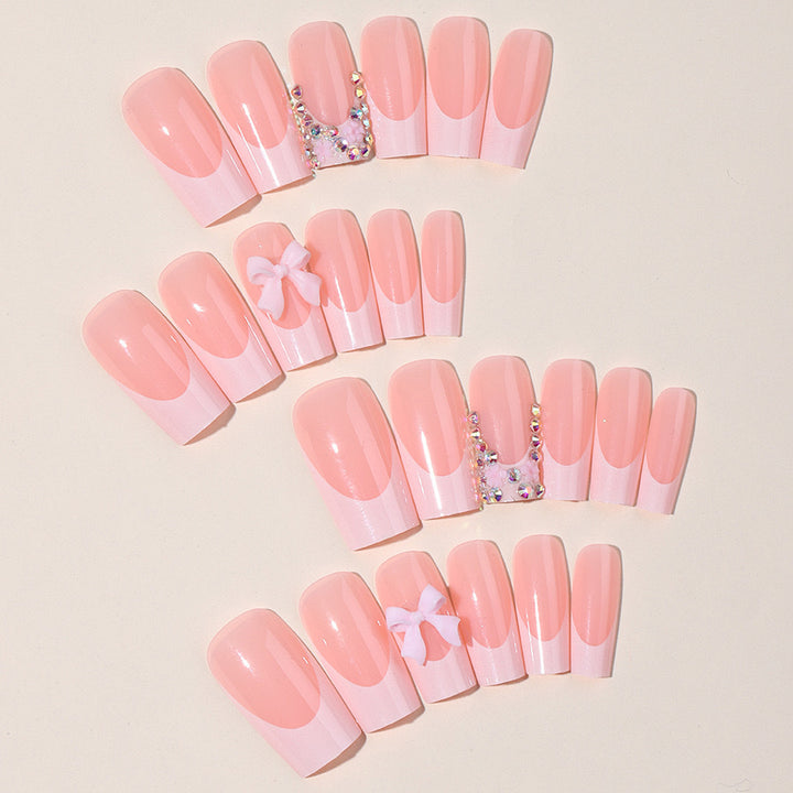 Artifical nail set with glamorous 3D bows and crystal embellishments Stornfield