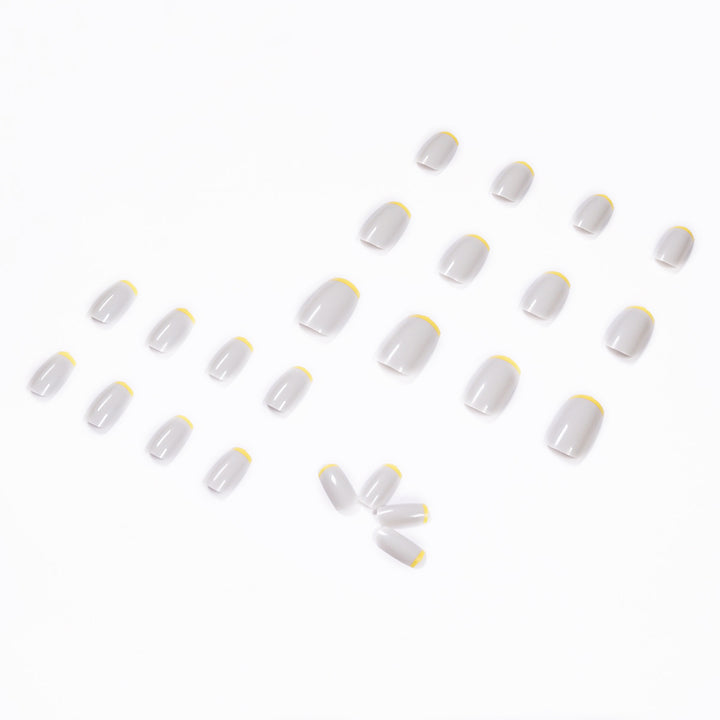 Artistic nail extensions with modern French-tip design Stornfield