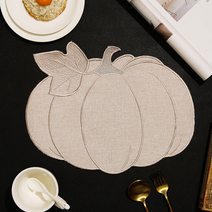 Pumpkin-shaped table set made of linen look with quilted contours and heat-resistant placemat