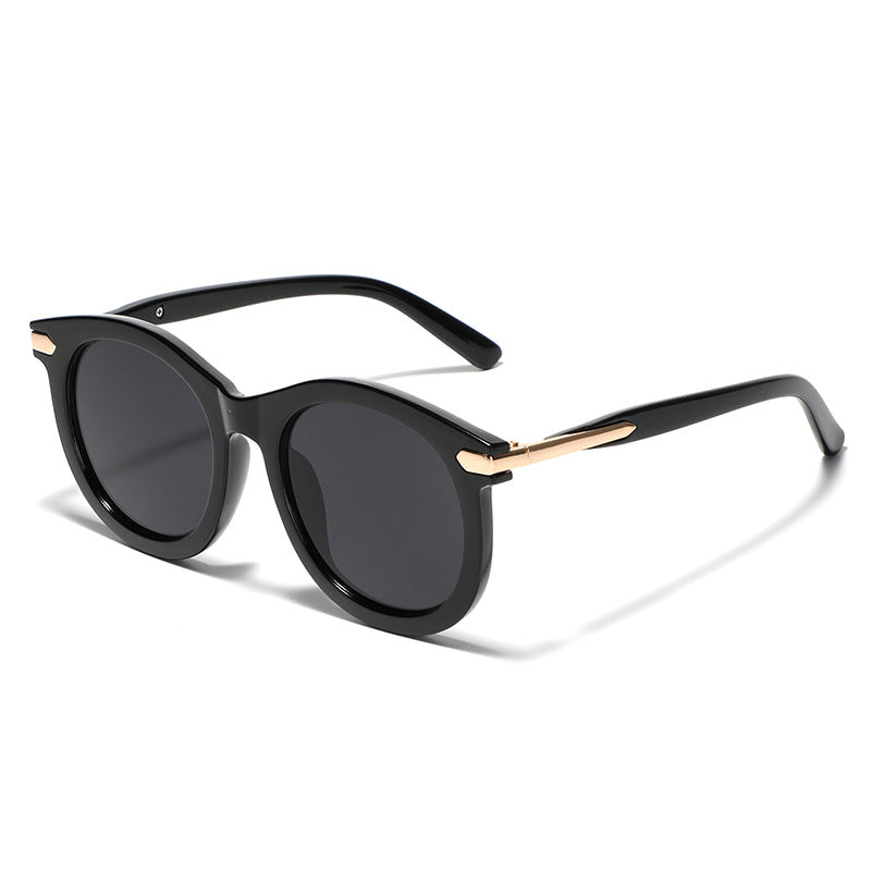 Women's fashionable sunglasses with transparent frame and golden accents Stornfield