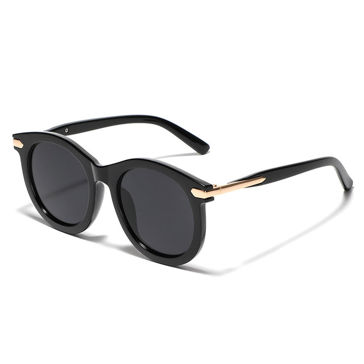 Women's fashionable sunglasses with transparent frame and golden accents Stornfield