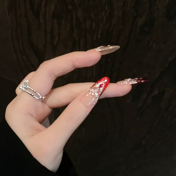Artificial nail tips with sparkling crystal embellishments Stornfield