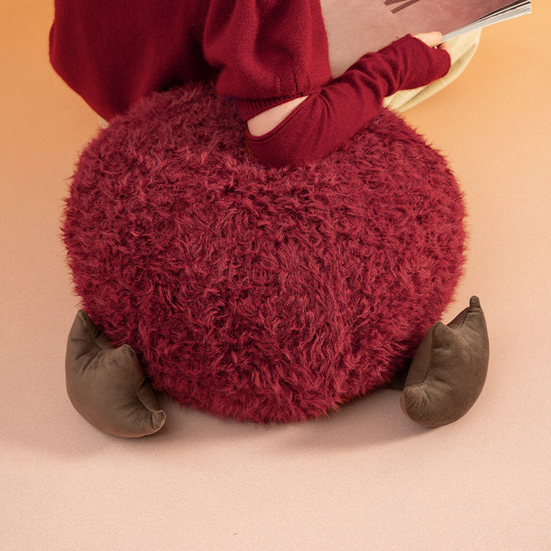 Cozy children's pouf seat with plush cover and decorative animal feet