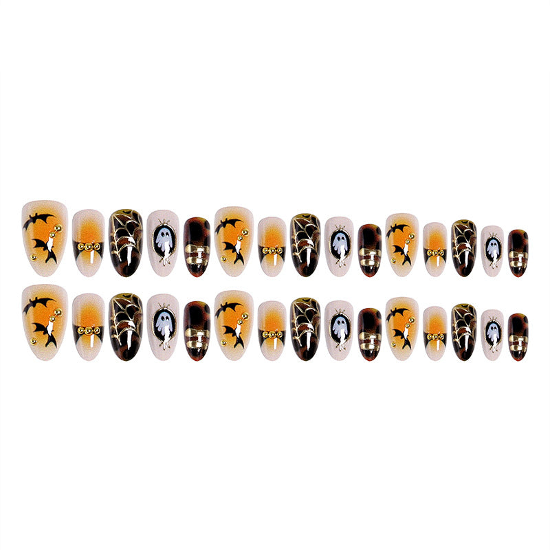 Artificial nails with Halloween motifs and glitter details Stornfield