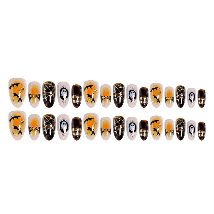 Artificial nails with Halloween motifs and glitter details Stornfield