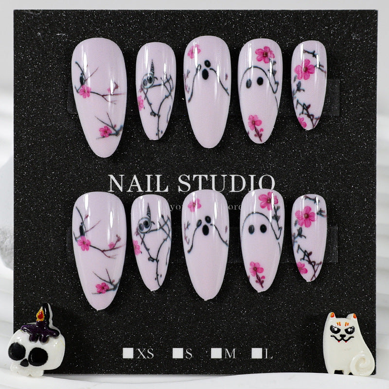 Artificial nail set with playful ghost and flower motifs Stornfield