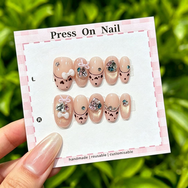 Decorative Press-On Nail Art Set with Elegant Bow and Gem Accents