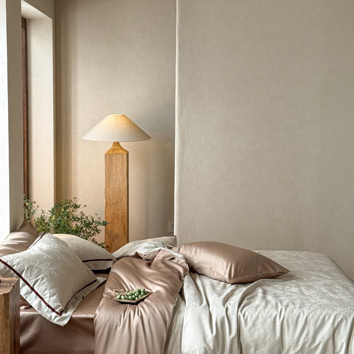 Premium bedding set made of breathable cotton blend with contrasting piping