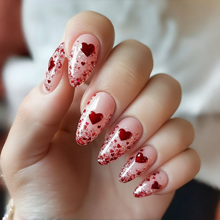 Artificial nails with sparkling heart design and glitter coating Stornfield