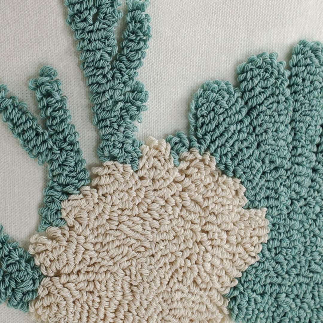 Elegant decorative pillow with coral-shaped design