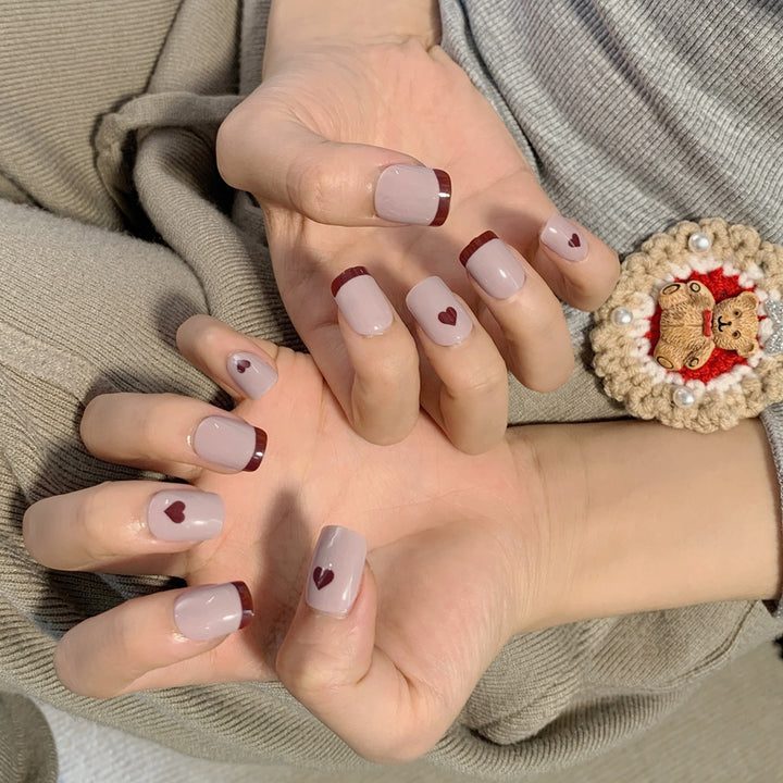 Artful nail extensions with an elegant leaf pattern Stornfield