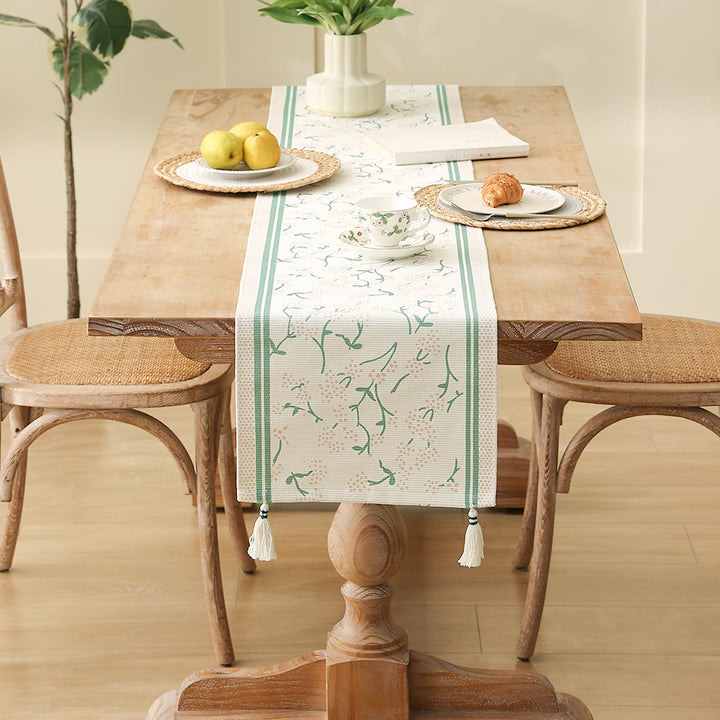 decorative table runner made of woven cotton with tassels Stornfield