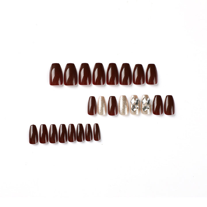 Artfully designed Gel nails with rhinestone decorations Stornfield