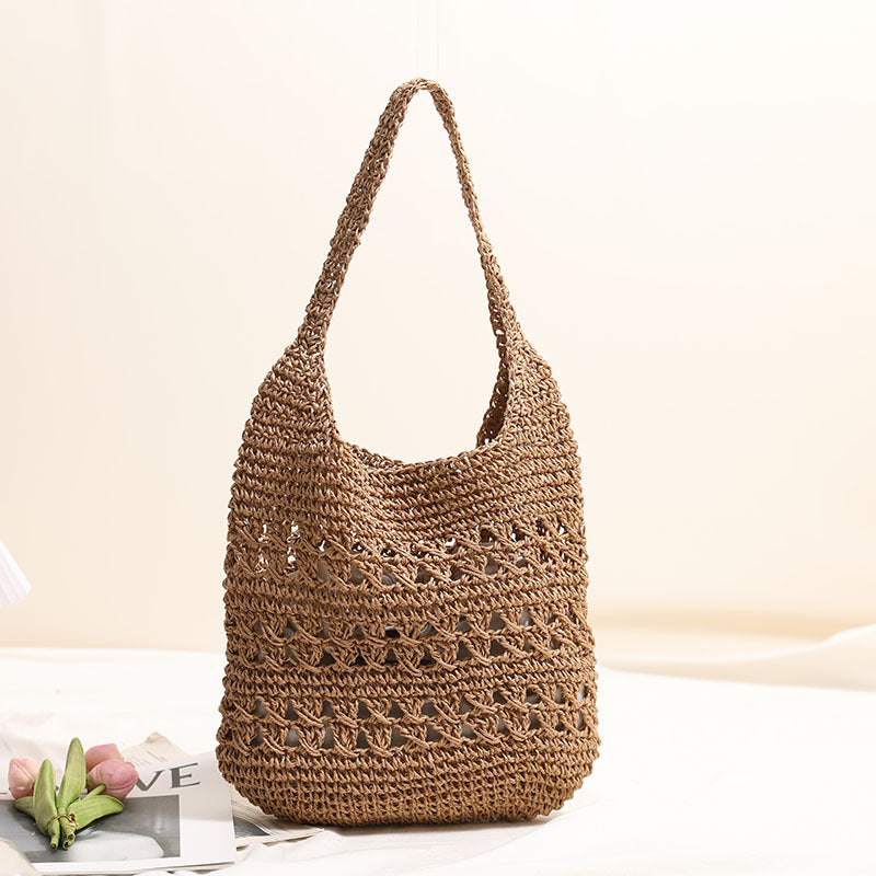 Crocheted shoulder bag with decorative hole pattern Stornfield