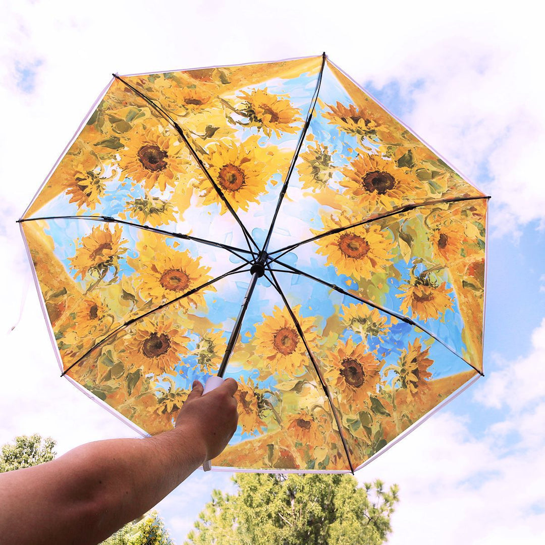 Women's collapsible umbrella with playful sunflower design Stornfield