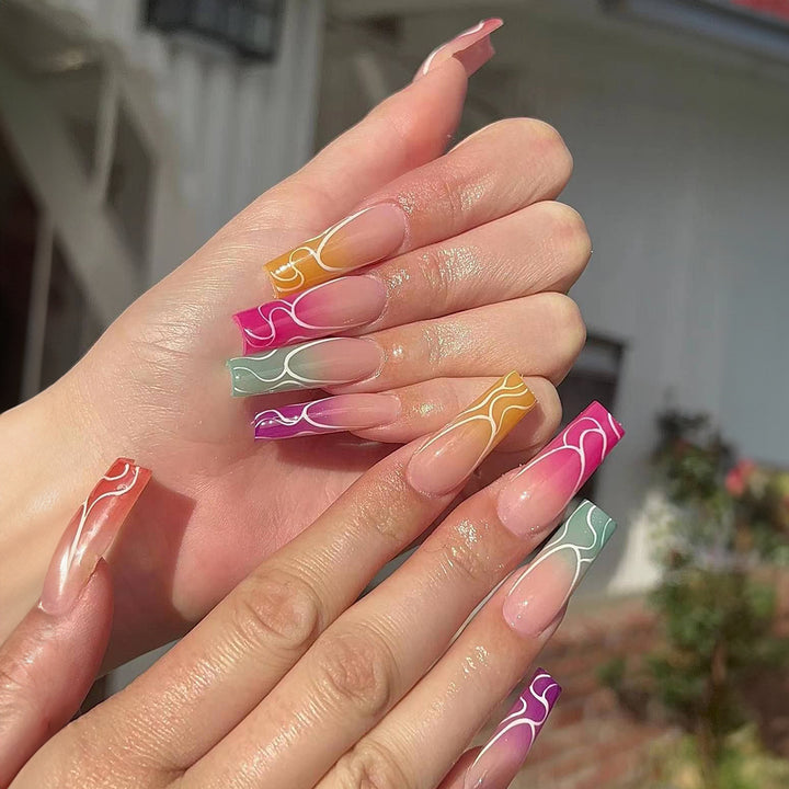 Artistic Press-On Nail Set with Gradient Swirl Designs Stornfield