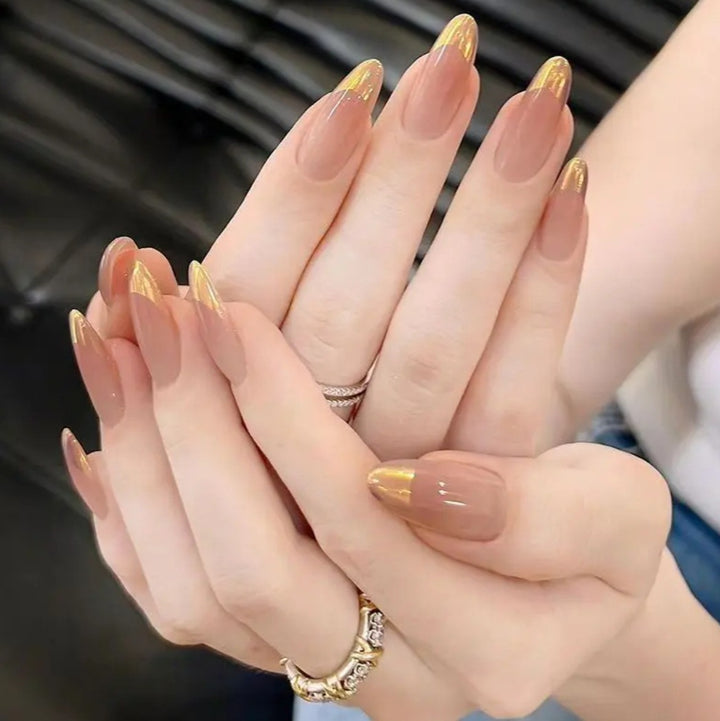 Nail art with elegant gradient and metallic accents Stornfield