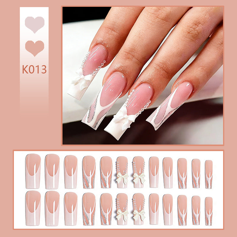 Elegant Fake Nails with Pearl and Bow Decorations Stornfield