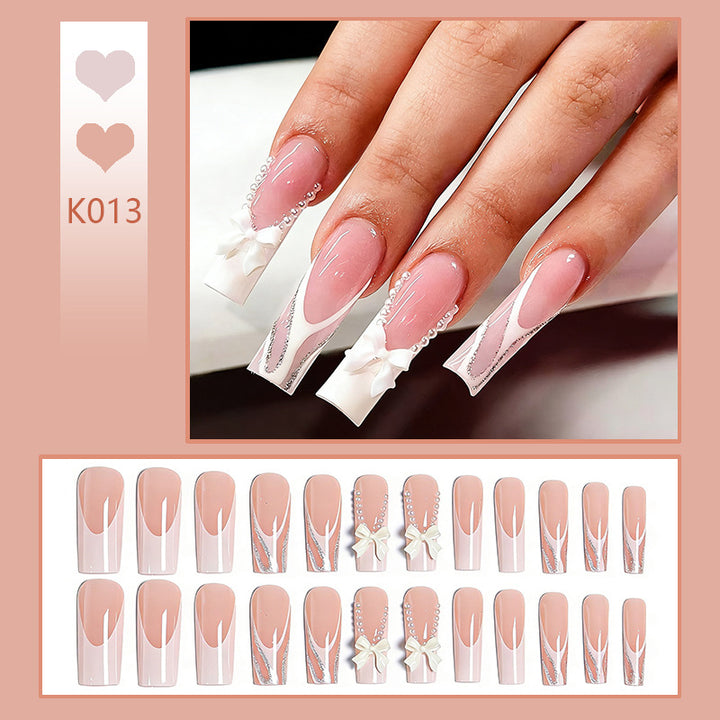 Elegant Fake Nails with Pearl and Bow Decorations Stornfield