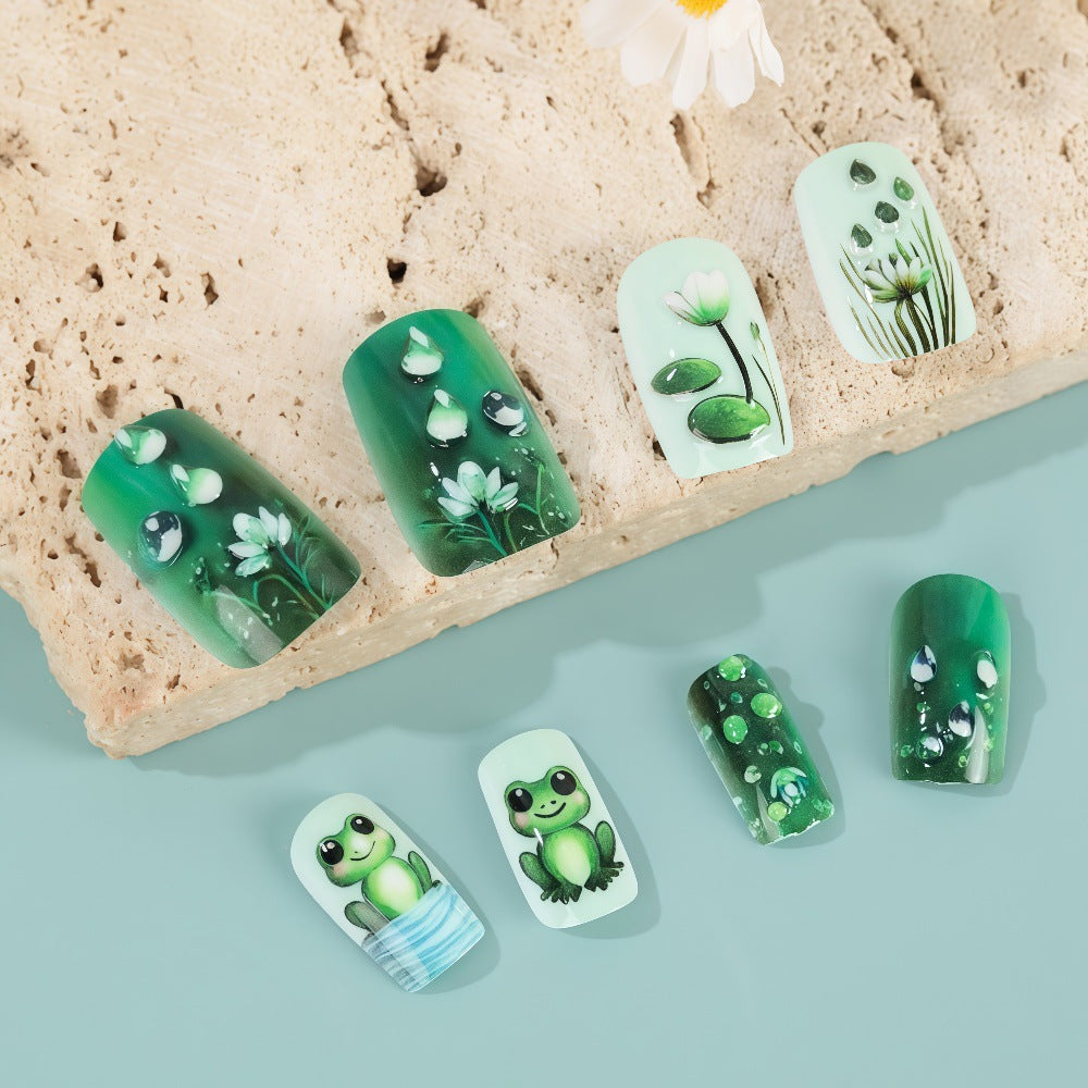 Creative art nails with frogs and plant details Stornfield