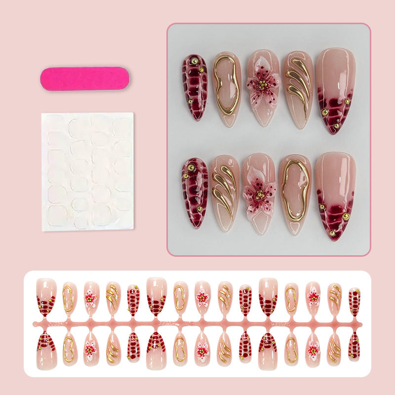 Creative nail art set with floral embellishments and glamorous accents Stornfield