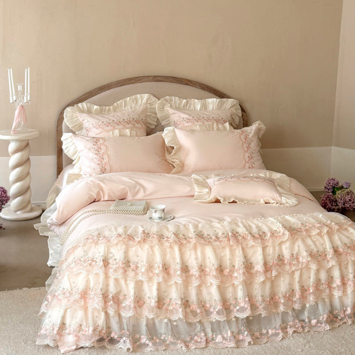 Luxurious Victorian-inspired bedding set with ruffles and embroidery