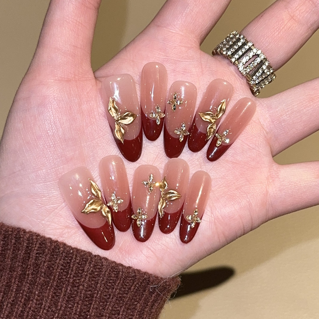 Artificial nails with luxurious flower and glitter elements Stornfield