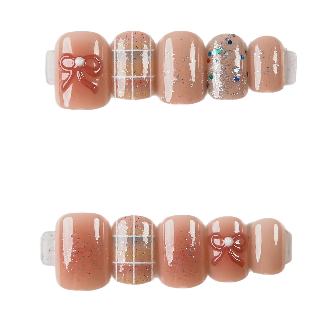 Artistic Press-On Nail Set with Decorative Bow Accents