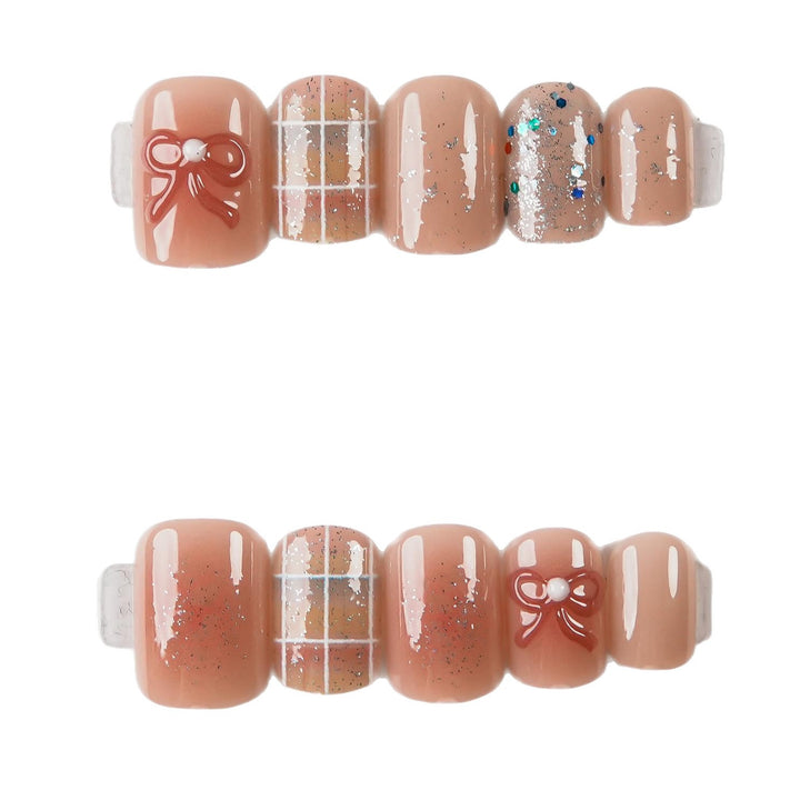 Artistic Press-On Nail Set with Decorative Bow Accents