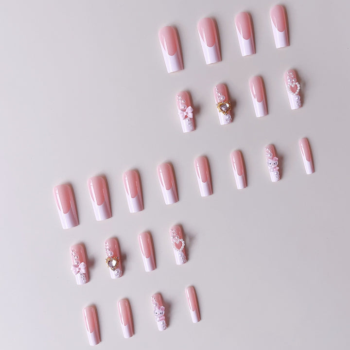 Glamorous artificial nails with 3D decorations and pearl accents Stornfield