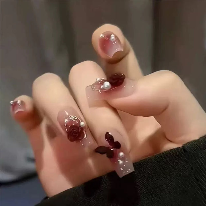 Artificial nail set with elegant floral 3D decorations Stornfield