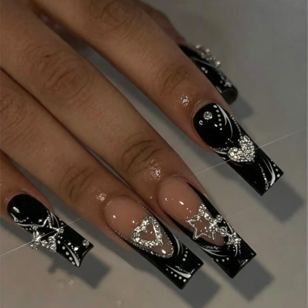 Artificial nails with elegant glitter accents and heart motifs Stornfield