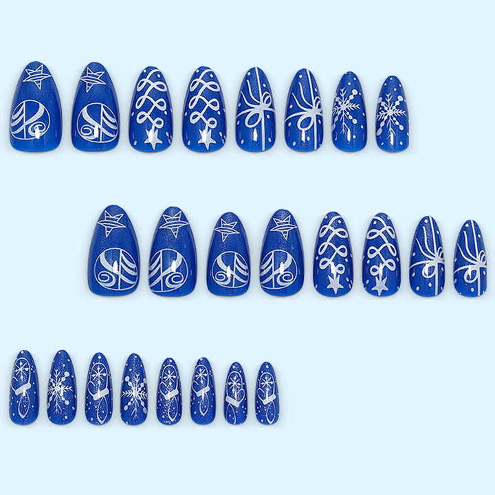 Artificial nails in festive winter design with glittering snowflakes and elegant decorations Stornfield