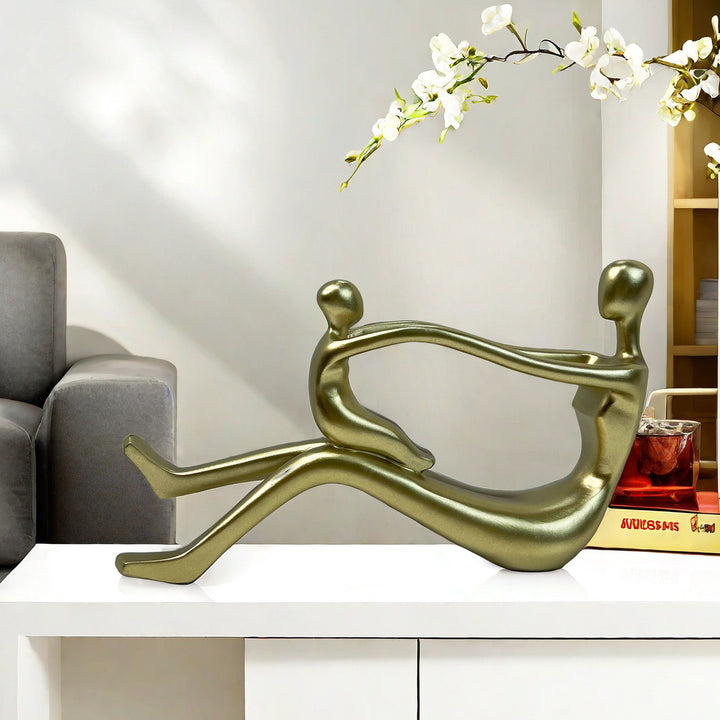 Stylish sculpture with intertwined figures Stornfield