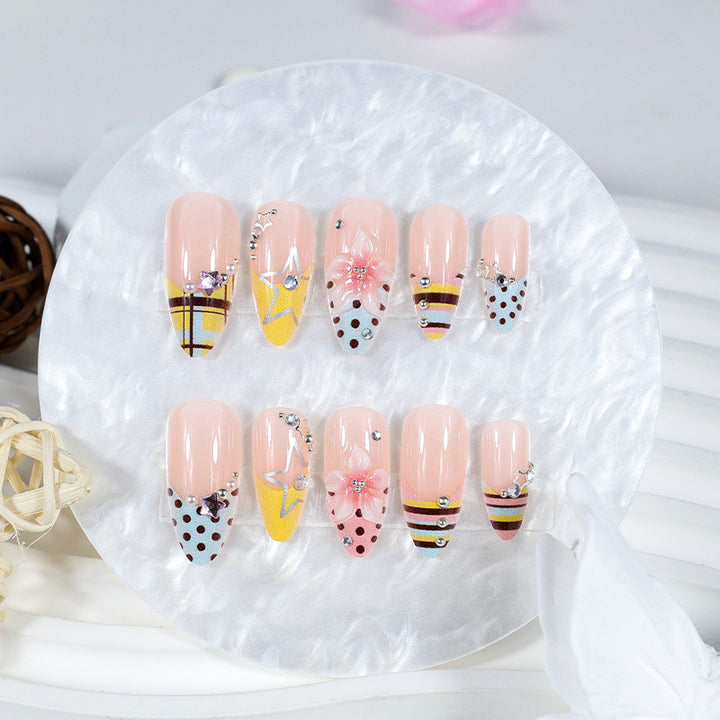 Creative nail art set with floral and geometric designs Stornfield