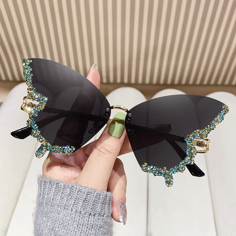 Women's extravagant sunglasses with sparkling butterfly design Stornfield