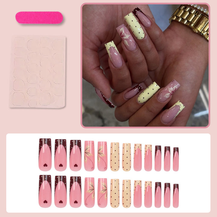 Acrylic nail set with elegant floral and polka dots design Stornfield