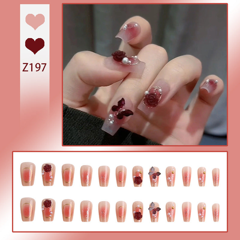 Nail art set with elegant 3D flower and butterfly decorations Stornfield