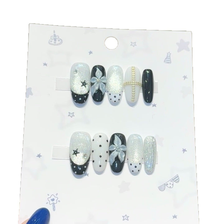 Glamorous artificial nail tips with floral accents Stornfield