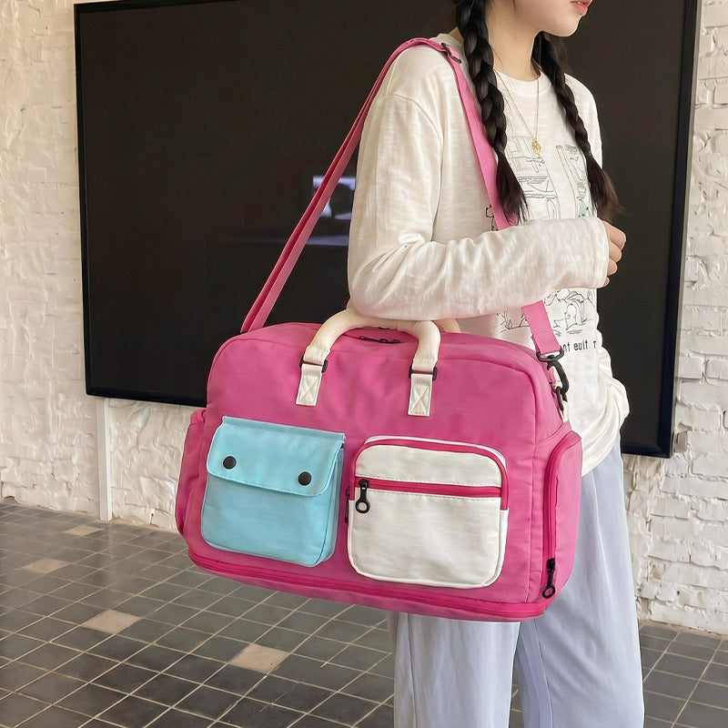 Sporty travel bag with multiple pockets and adjustable shoulder strap Stornfield