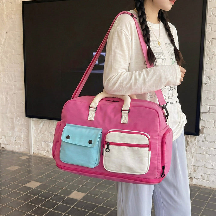 Sporty travel bag with multiple pockets and adjustable shoulder strap Stornfield