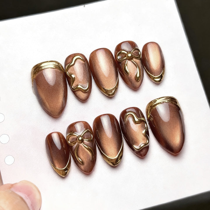 Elegant artificial nails with gold accents Stornfield