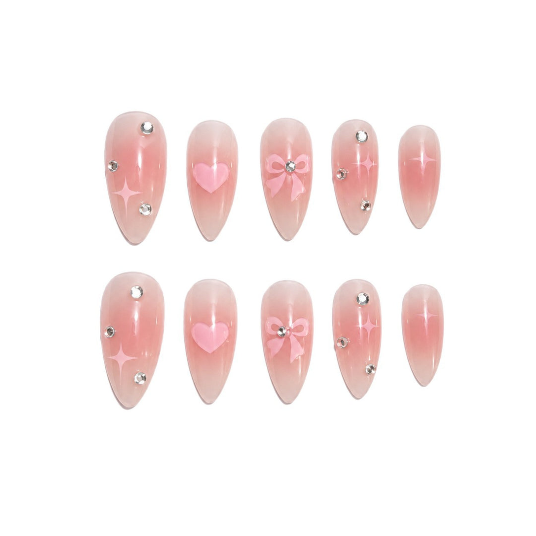 Artificial nails with romantic heart and bow design Stornfield