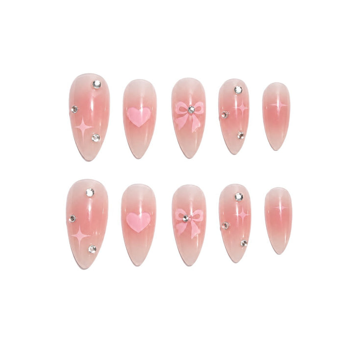 Artificial nails with romantic heart and bow design Stornfield
