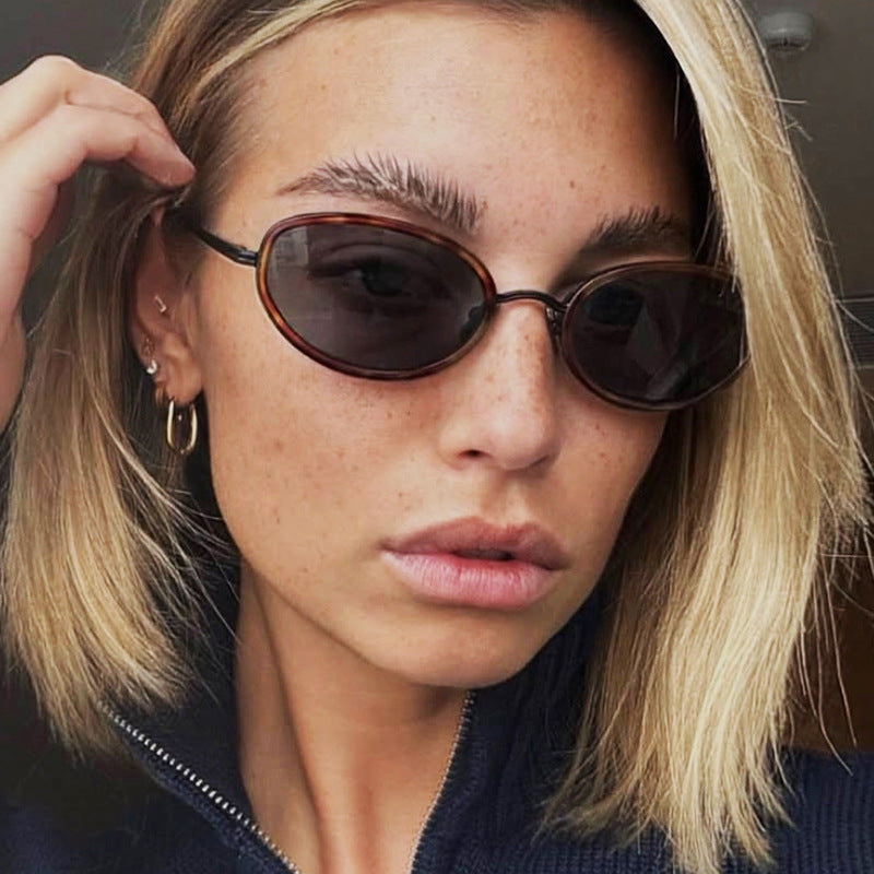 Ladies elegant round sunglasses with stylish metal frame Stornfield