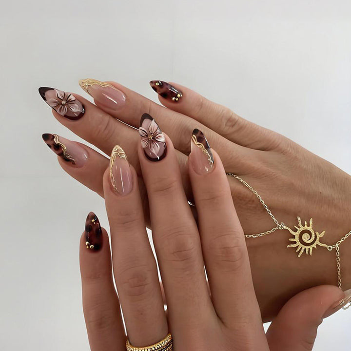 Artificial nail set with elegant floral accents and sparkling design Stornfield